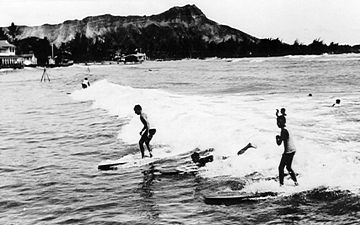 Diamond head waikiki old photo. Surfers surfing.